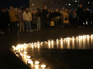 Hundreds hold vigil for victims of roof collapse in northern Serbian city