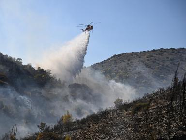 Firefighters battle massive Belgian wildfire, forcing hundreds to evacuate