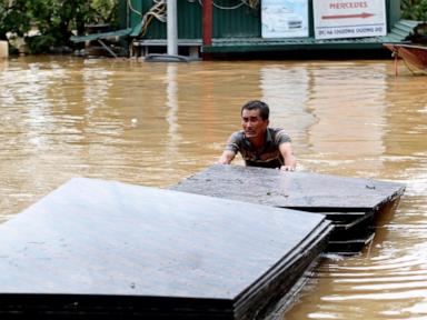 Flash flood sweeps away hamlet as Vietnam's storm toll rises to 155 dead