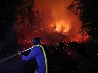 Indonesia intensifies aerial firefighting as wildfire haze spreads to Malaysia