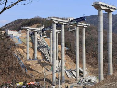 An elevated part of a highway being built in South Korea collapses, killing 3 workers