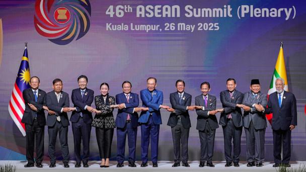ASEAB leaders chain their hands while posing for a picture before the start of the plenary session at the Association of Southeast Asian Nations (ASEAN) Summit in Kuala Lumpur, Malaysia, Monday, May 26, 2025. From left to right, Laos's Prime Minister Sonexay Siphandone, Myanmar Permanent Secretary of the Ministry of Foreign Affairs Aung Kyaw Moe, Singapore's Prime Minister Lawrence Wong, Thailand's Prime Minister Paetongtarn Shinawatra, Vietnam's Prime Minister Pham Minh Chinh, Malaysia's Prime Minister Anwar Ibrahim, Philippine's President Ferdinand Marcos Jr., Brunei's Sultan Hassanal Bolkiah, Cambodian Prime Minister Hun Manet, Indonesia's President Prabowo Subianto and East Timor's Prime Minister Xanana Gusmao. (AP Photo/Vincent Thian)