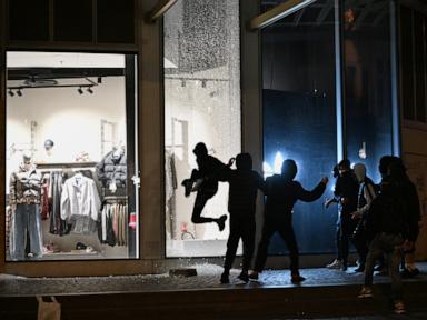Macron rejects minister’s resignation as rioting and looting expose policing failures