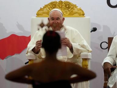 Pope lands in economic power Singapore after a joyous visit to impoverished, devout East Timor