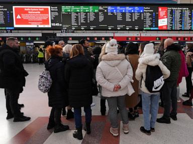 UK rail travel returns to normal after problems with a radio system disrupted the morning commute