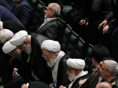 Iran’s new president is sworn in and pledges to keep trying to remove Western sanctions