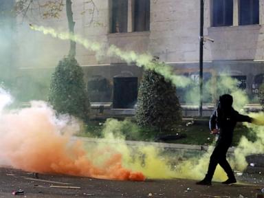 Arrests made as Georgian police clash with protesters over suspension of EU talks