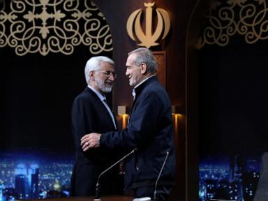 Iran holds runoff presidential vote between hard-liner and reformist