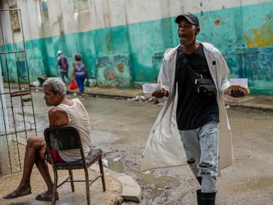 Cuba fights to come back from a nationwide blackout, then a storm that killed 7