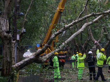 2 people reported dead in China as Typhoon Bebinca is downgraded to a tropical storm