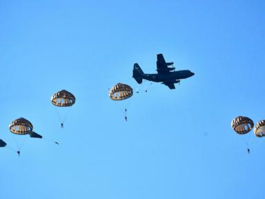 Hundreds of parachutists drop over Dutch heath to commemorate World War II operation