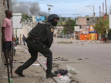 Haiti's main airport and capital frozen a day after a plane was shot by gangs