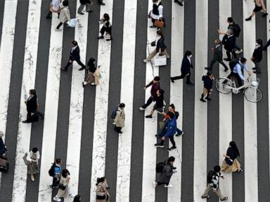 Japan passes $250B economic package meant to lift wages and spur growth