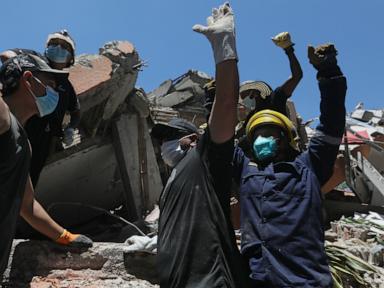 Rescuers call for silence around earthquake rubble as window for survival narrows in Colombia