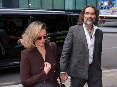 Russell Brand arrives for his trial on rape and sexual assault charges