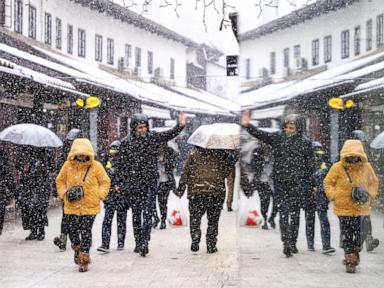 Rescuers reach a stranded hiker in Slovenia but another is missing during a Balkans snowstorm