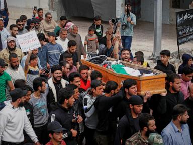 Mourners attend funeral of man killed in Israeli airstrikes on Syrian city of Daraa