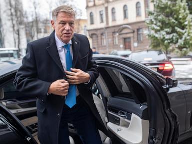 Romania's Iohannis steps down, leaving caretaker pres. in charge until election rerun