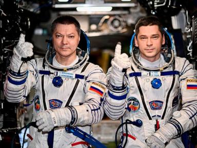 2 Russians set record for longest single stay on the International Space Station