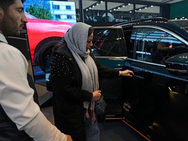 Iran loosens import restrictions on foreign cars and iPhones, trying to mask its economic woes