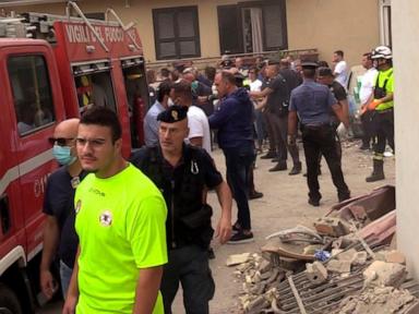 Building collapse in Naples kills 2 siblings and buries mother and another woman