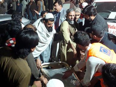 Pakistan holds funeral prayers for 12 people killed in suicide bombing