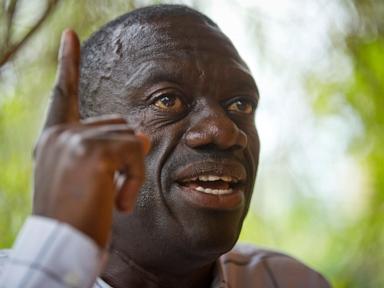 Wife of Ugandan opposition figure Besigye says he was kidnapped and is being held in a military jail