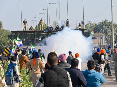 Police in India clash with farmers during protest march over minimum price demand for crops