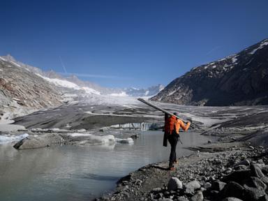 Photos show Swiss glaciers' uncertain future as 'ambassadors of climate change'