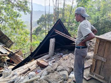 Magnitude 7.7 earthquake strikes off Indonesia; buildings toppled and 2 dead