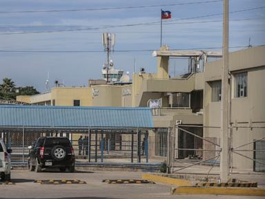 Haiti's main international airport reopens a month after gang gunfire forced it to close