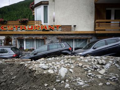 Storms in Switzerland cause flooding and a landslide that left at least 2 people dead