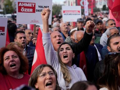 Hundreds in Turkey protest the arrest and ouster of opposition mayor