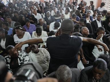 Hundreds attend funeral in Haiti for 4 victims of brutal gang attack that killed 47