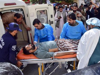 Bomb targeting police assigned for polio drive kills 9 people, including 5 children, in SW Pakistan