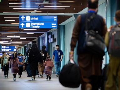 Scores of Afghans have left for the US after their visas were processed in the Philippines