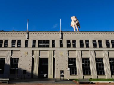 A New Zealand city waves goodbye to its giant hand sculpture that many came to love