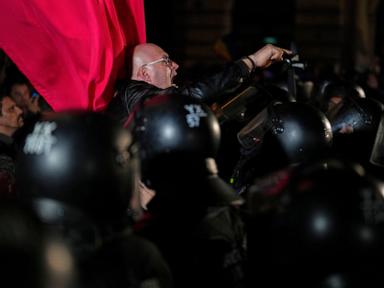 Chaos in Romania's capital after far-right Calin Georgescu barred from presidential redo