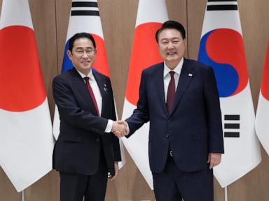 Outgoing Japanese leader will visit South Korea for a summit on improving ties