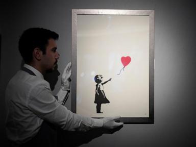 2 men are charged with stealing a famous Banksy artwork from a London gallery