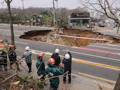 Motorcyclist who disappeared into huge sinkhole found dead after overnight search