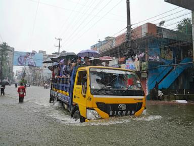 Floods maroon many people in Bangladesh and India and cause at least 15 deaths