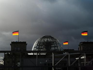 The Latest: Polls open in Germany in crucial general election