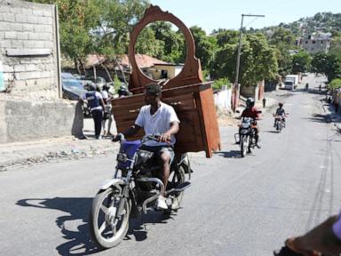 Gang coalition in Haiti spreads violence to Port-au-Prince neighborhood, setting fire to homes