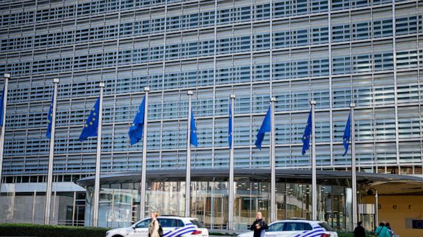 FILE - Police cars stand outside EU headquarters in Brussels, Sept. 30, 2022. (AP Photo/Virginia Mayo, file)