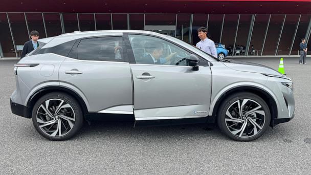 Reporters try out Nissan’s e-Power electrification technology on the current Qashqai model at the company’s Grandrive facility in Yokosuka, Japan, outside Tokyo, Monday, May 26, 2025. (AP Photo/Yuri Kageyama)