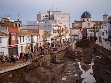 Crashing waves in a hilltop village, a night of terror from Spain's floods