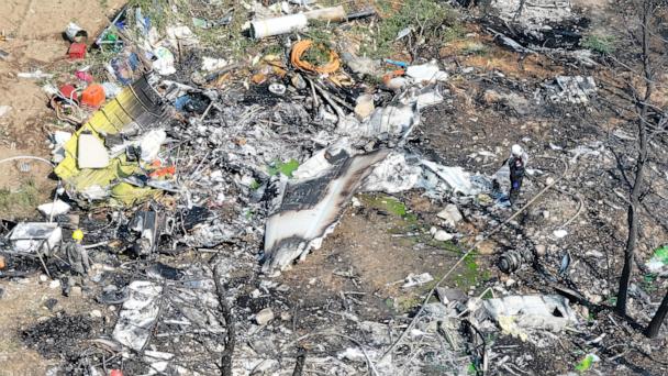 Debris of a South Korean navy plane is seen after it crashed in Pohang, South Korea, Thursday, May 29, 2025. (Run Kwan-shik/Yonhap via AP)