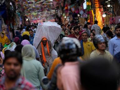 Indians celebrate Diwali by lighting a record number of earthen lamps