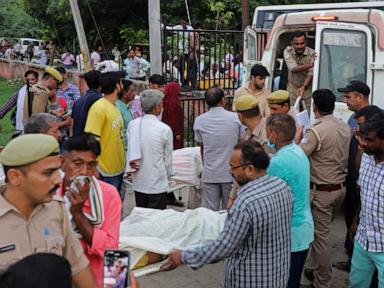 Massive overcrowding, lack of exits and slippery mud contributed to deadly stampede in India